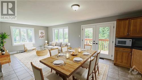 Virtually Staged  Main Level In-Law Suite - Living Room with balcony - 103 Lady Slipper Way, Carp, ON - Indoor Photo Showing Dining Room