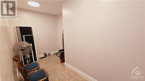 Main Level In-Law Suite - Laundry / Storage Room - 103 Lady Slipper Way, Carp, ON - Indoor Photo Showing Other Room