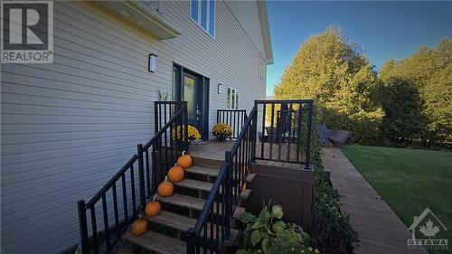 Front entrance to common foyer leads to the primary residence and the main level in-law suite - 103 Lady Slipper Way, Carp, ON - Outdoor With Exterior