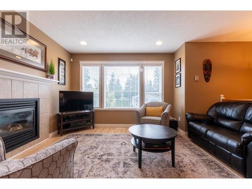 4686 Gray Drive, Prince George, BC - Indoor Photo Showing Living Room With Fireplace