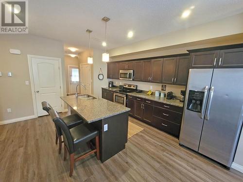 8708 82 Street, Fort St. John, BC - Indoor Photo Showing Kitchen With Double Sink With Upgraded Kitchen