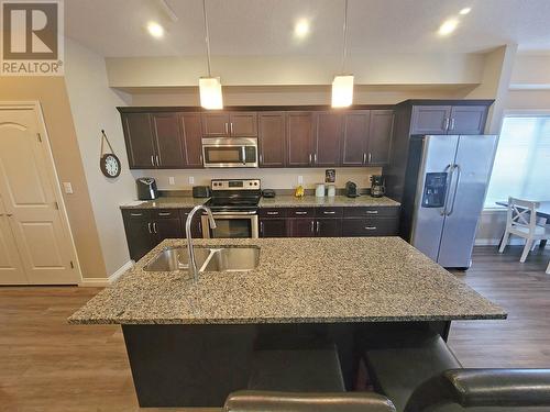 8708 82 Street, Fort St. John, BC - Indoor Photo Showing Kitchen With Double Sink With Upgraded Kitchen