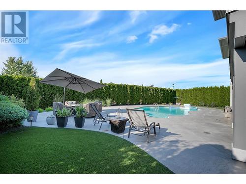 440 Audubon Court, Kelowna, BC - Outdoor With In Ground Pool