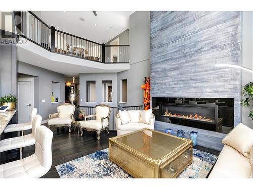 440 Audubon Court, Kelowna, BC - Indoor Photo Showing Living Room With Fireplace