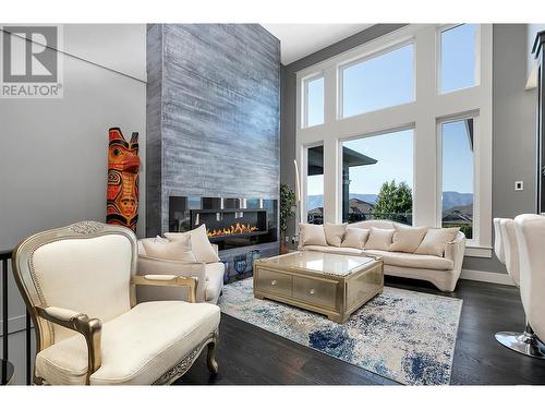 440 Audubon Court, Kelowna, BC - Indoor Photo Showing Living Room With Fireplace