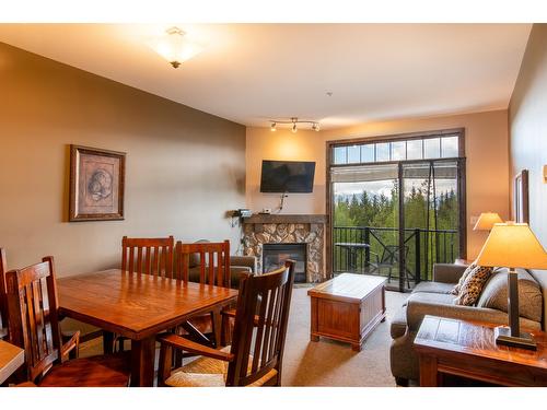 303 - 1549 Kicking Horse Trail, Golden, BC - Indoor With Fireplace