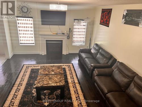 94 Checkerberry Crescent, Brampton, ON - Indoor Photo Showing Living Room With Fireplace