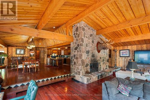 1663 Horseshoe Lake Road, Minden Hills, ON - Indoor With Fireplace