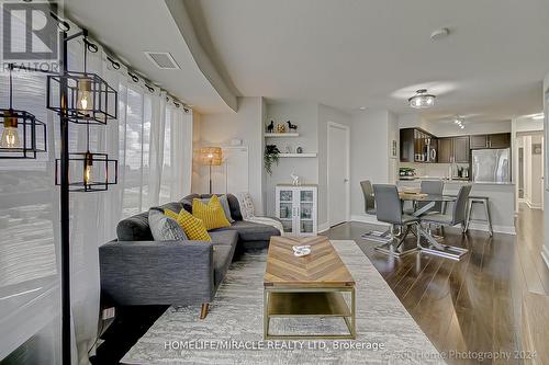 1410 - 125 Village Green Square, Toronto, ON - Indoor Photo Showing Living Room