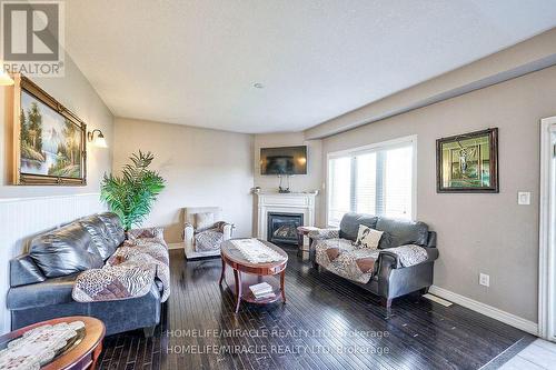 166 Shephard Avenue, New Tecumseth, ON - Indoor Photo Showing Living Room With Fireplace