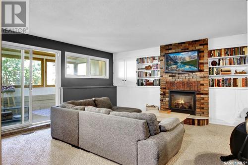 30 Laubach Avenue, Regina, SK - Indoor Photo Showing Living Room With Fireplace