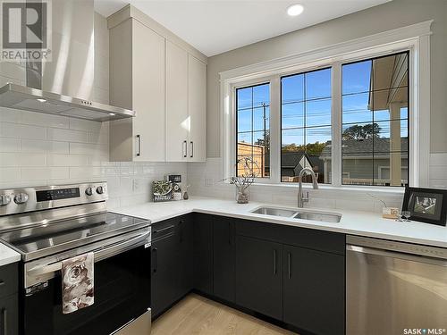 1112 9Th Street E, Saskatoon, SK - Indoor Photo Showing Kitchen With Double Sink