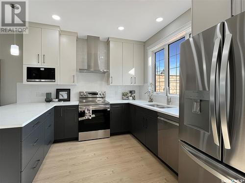 1112 9Th Street E, Saskatoon, SK - Indoor Photo Showing Kitchen With Double Sink With Upgraded Kitchen