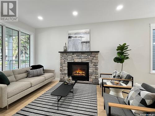 1112 9Th Street E, Saskatoon, SK - Indoor Photo Showing Living Room With Fireplace