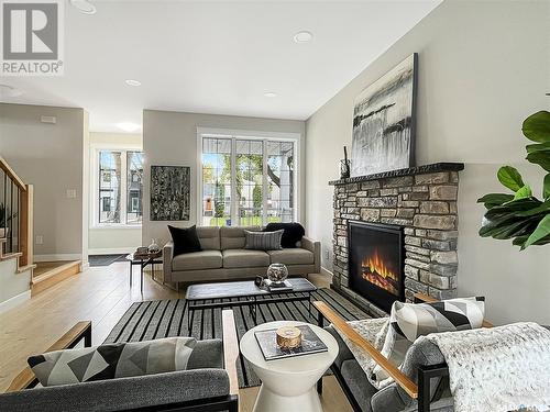 1112 9Th Street E, Saskatoon, SK - Indoor Photo Showing Living Room With Fireplace