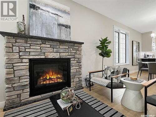 1112 9Th Street E, Saskatoon, SK - Indoor Photo Showing Living Room With Fireplace