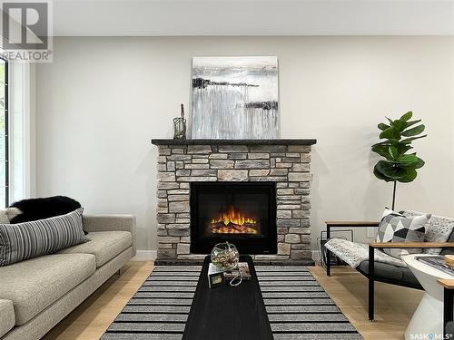 1112 9Th Street E, Saskatoon, SK - Indoor Photo Showing Living Room With Fireplace