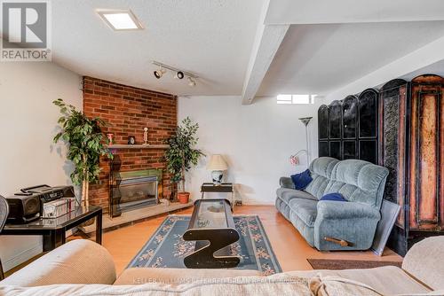 62 Lafferty Street, Toronto, ON - Indoor Photo Showing Living Room With Fireplace