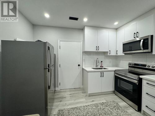 201 - 238 Queen Street S, Mississauga, ON - Indoor Photo Showing Kitchen