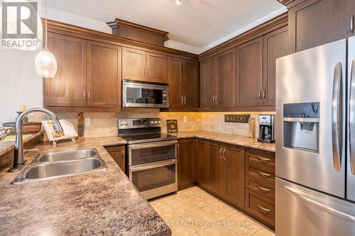 39 - 310 Southbrook Drive, Hamilton, ON - Indoor Photo Showing Kitchen With Stainless Steel Kitchen With Double Sink