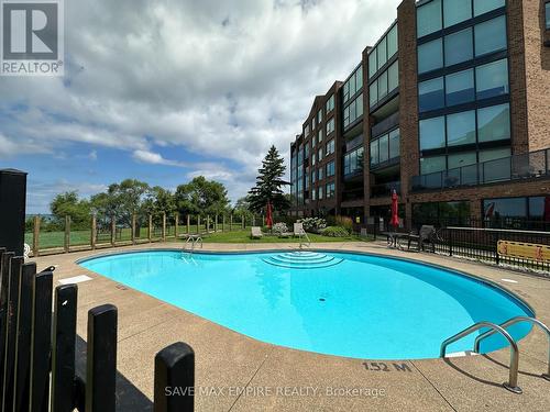 2402 - 701 Geneva Street, St. Catharines, ON - Outdoor With In Ground Pool