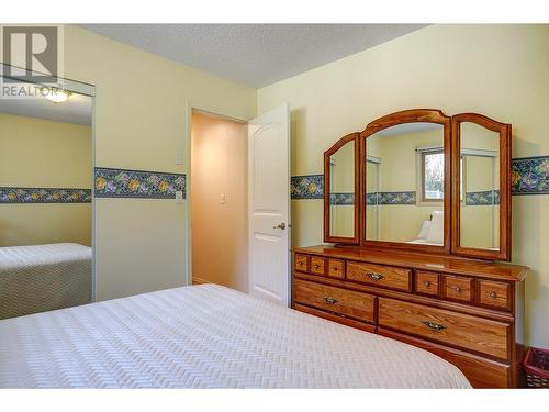 7697 Silver Star Road, Vernon, BC - Indoor Photo Showing Bedroom