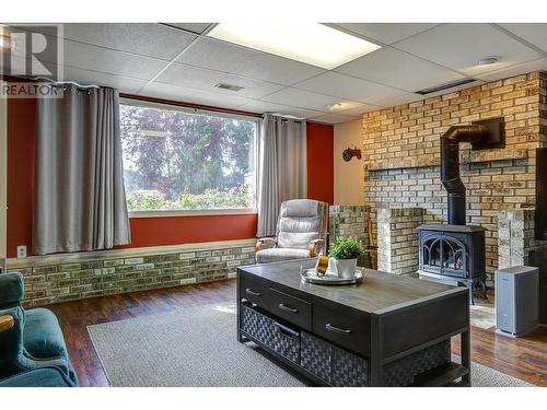 7697 Silver Star Road, Vernon, BC - Indoor Photo Showing Other Room With Fireplace