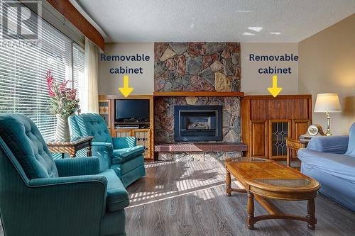 7697 Silver Star Road, Vernon, BC - Indoor Photo Showing Living Room With Fireplace