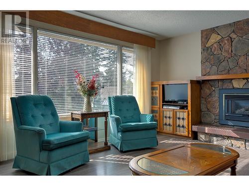 7697 Silver Star Road, Vernon, BC - Indoor Photo Showing Living Room With Fireplace