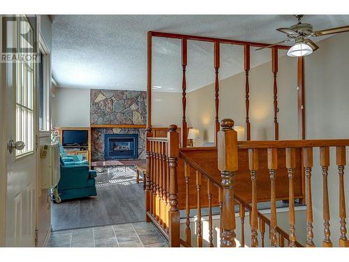 7697 Silver Star Road, Vernon, BC - Indoor Photo Showing Other Room With Fireplace