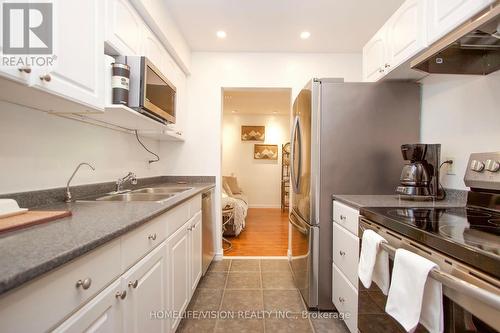 W12 - 220 Ormond Drive, Oshawa, ON - Indoor Photo Showing Kitchen With Double Sink