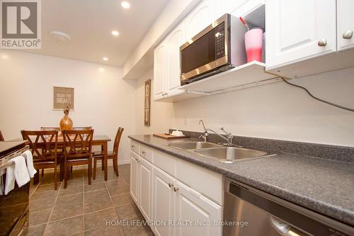 W12 - 220 Ormond Drive, Oshawa, ON - Indoor Photo Showing Kitchen With Double Sink