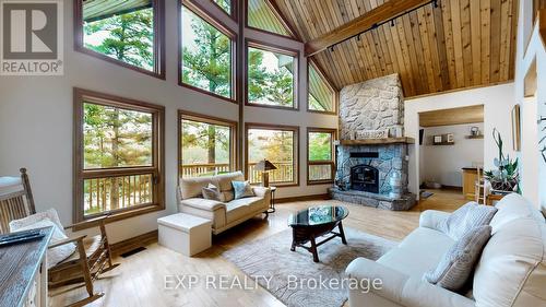 3413 Flat Rapids Lane, Severn, ON - Indoor Photo Showing Living Room With Fireplace