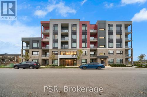 202 - 3285 Carding Mill Trail, Oakville, ON - Outdoor With Balcony With Facade