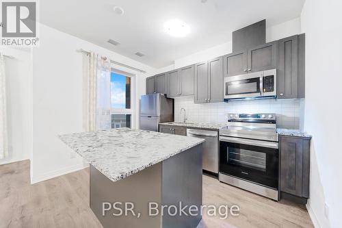 202 - 3285 Carding Mill Trail, Oakville, ON - Indoor Photo Showing Kitchen With Stainless Steel Kitchen With Upgraded Kitchen