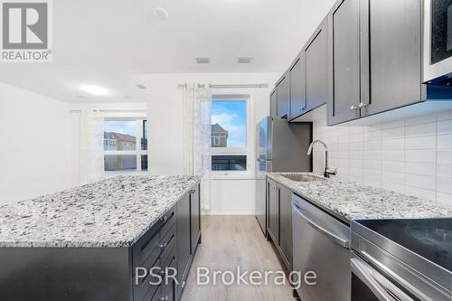 202 - 3285 Carding Mill Trail, Oakville, ON - Indoor Photo Showing Kitchen With Upgraded Kitchen