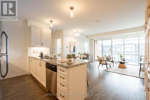 301 - 3028 Creekshore Common, Oakville, ON - Indoor Photo Showing Kitchen With Stainless Steel Kitchen