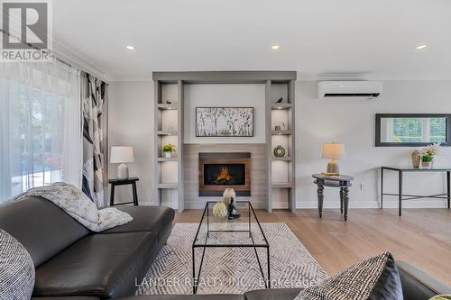 27 Shannon Road, East Gwillimbury, ON - Indoor Photo Showing Living Room With Fireplace