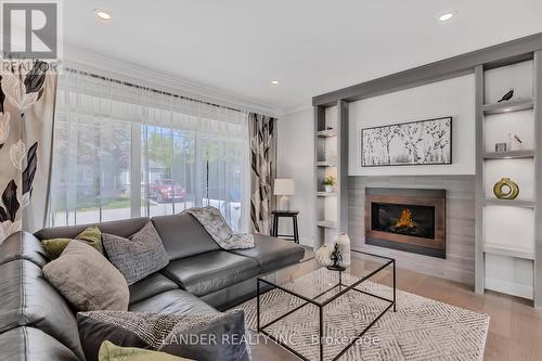 27 Shannon Road, East Gwillimbury, ON - Indoor Photo Showing Living Room With Fireplace