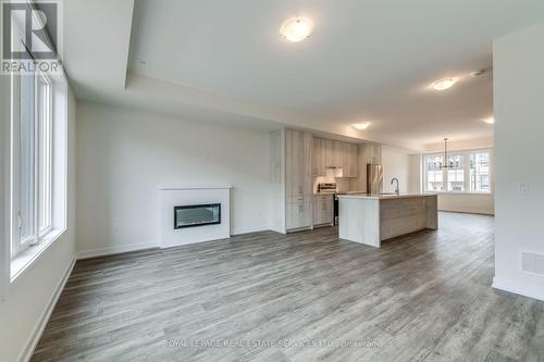 1335 Kobzar Drive, Oakville, ON - Indoor Photo Showing Living Room With Fireplace