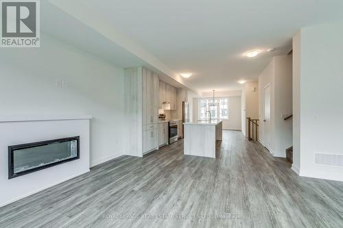 1335 Kobzar Drive, Oakville, ON - Indoor Photo Showing Living Room With Fireplace