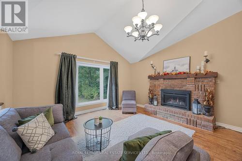 49 Birchwood Trail, Wasaga Beach, ON - Indoor Photo Showing Living Room With Fireplace