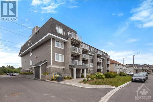 160 Whispering Winds Way Unit#210, Ottawa, ON - Outdoor With Balcony With Facade