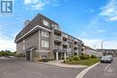 160 Whispering Winds Way Unit#210, Ottawa, ON  - Outdoor With Balcony With Facade 