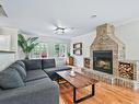 Salon - 37 Rue De La Butte, Brownsburg-Chatham, QC  - Indoor Photo Showing Living Room With Fireplace 