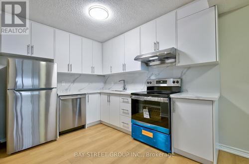 702 - 4091 Sheppard Avenue E, Toronto, ON - Indoor Photo Showing Kitchen With Stainless Steel Kitchen