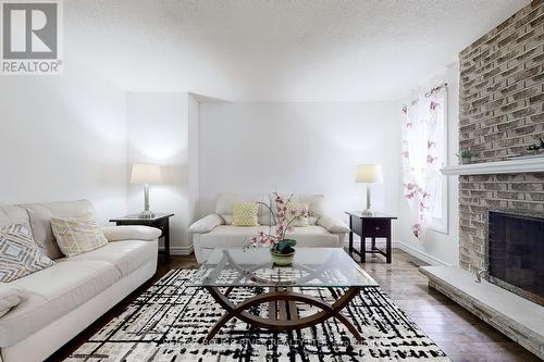 8 Sifton Place, Brampton, ON - Indoor Photo Showing Living Room With Fireplace