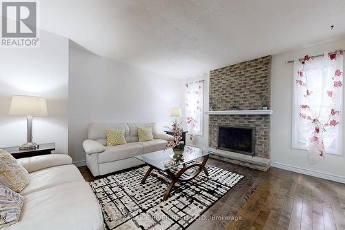 8 Sifton Place, Brampton, ON - Indoor Photo Showing Living Room With Fireplace