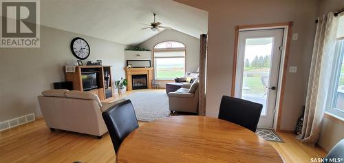 159 Sarah Drive S, Elbow, SK - Indoor Photo Showing Dining Room With Fireplace