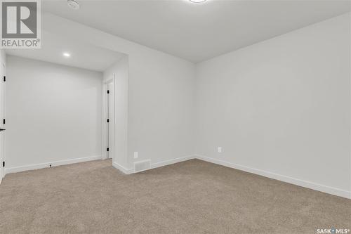 287 Flynn Bend, Saskatoon, SK - Indoor Photo Showing Other Room